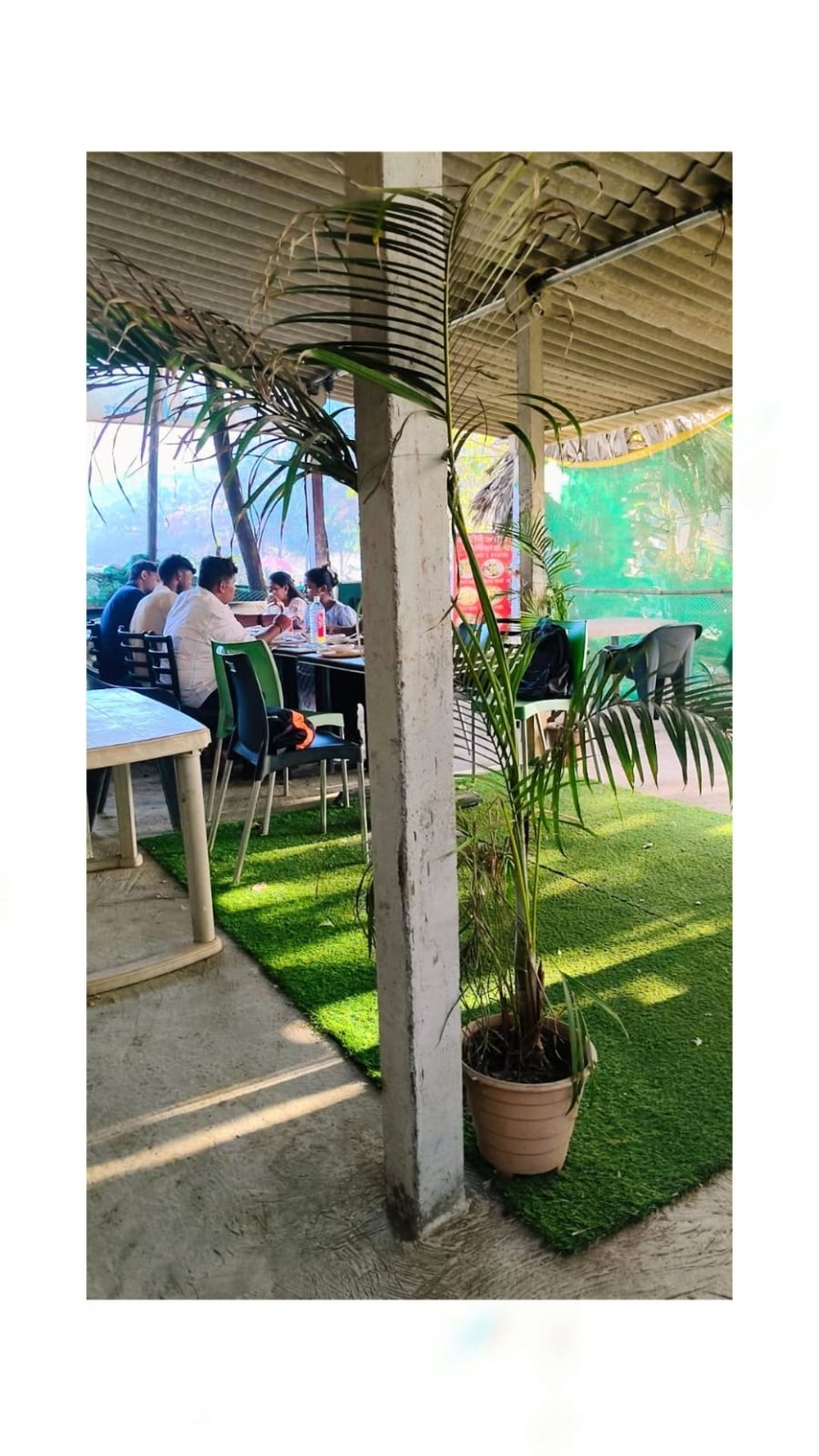 Outdoor seating at Aron Koliwada